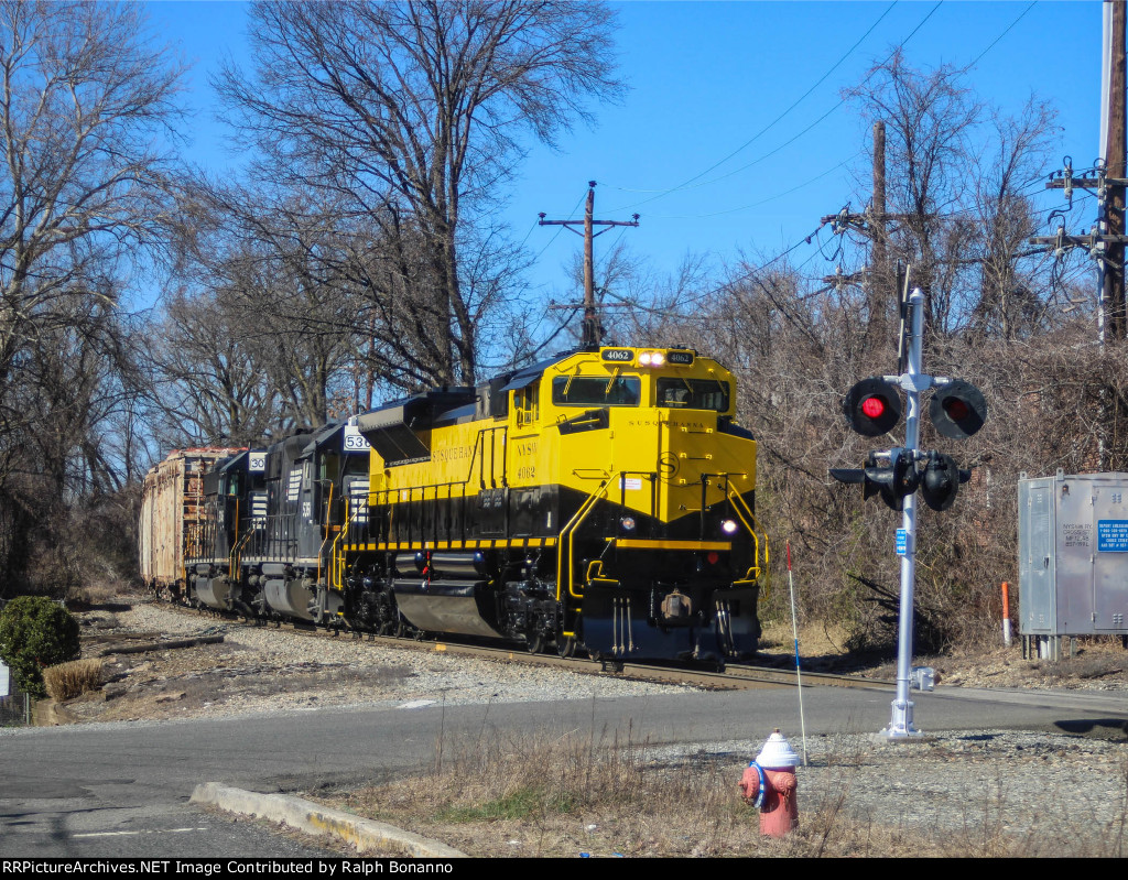 Local WS-1 returns to the yard at Crpss St with fresh put of the paint booth SD70M-2  4062